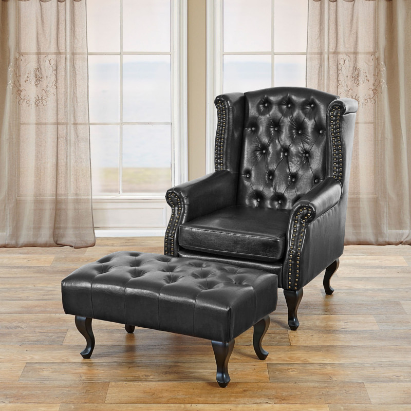 Fauteuil de luxe à oreilles Chesterfield similicuir - noir avec pouf